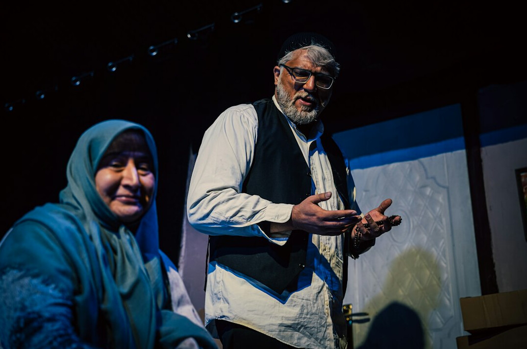 author receiving award on stage