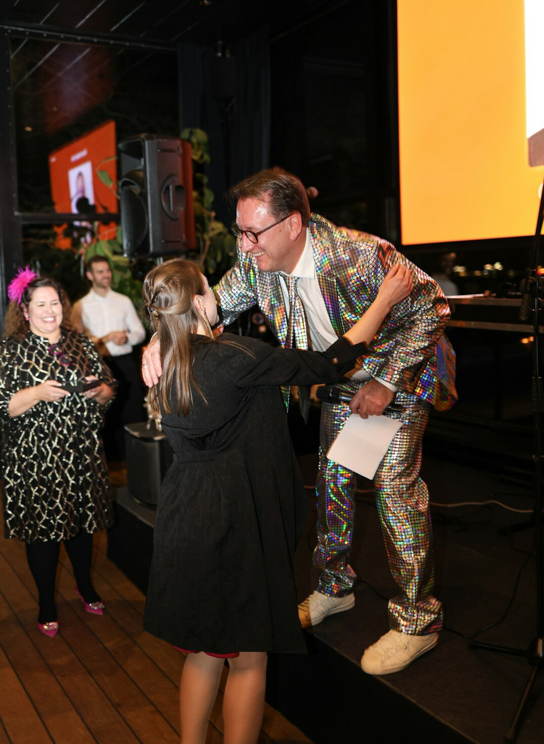 author receiving award on stage